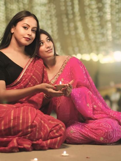 Sharing a moment of peace and connection, this portrait captures the bond between two friends celebrating the festival of lights on the Varanasi ghats.