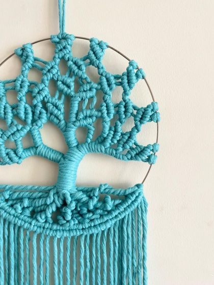 A close-up of the sky blue Tree of Life. The intricate knots that form the tree's canopy are my favorite part to create.