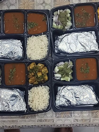 Today's special included a flavorful paneer sabzi and a comforting dal. You can see how neatly everything is packed to ensure it reaches you fresh and intact.
