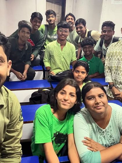 A happy group of students and teachers celebrating the refreshing spirit of green for Navratri 2024.