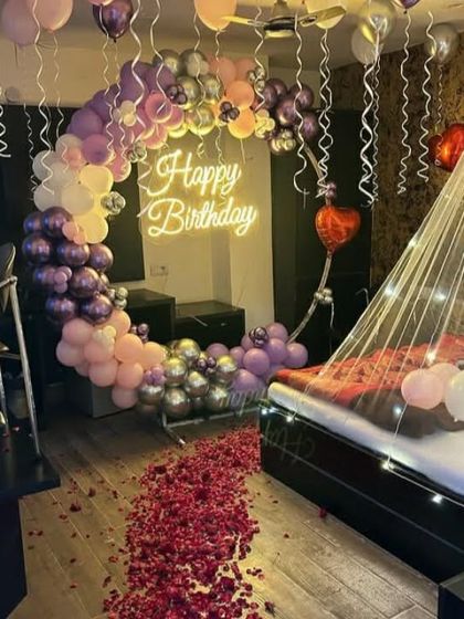 A view from the doorway of the fully decorated romantic birthday room.