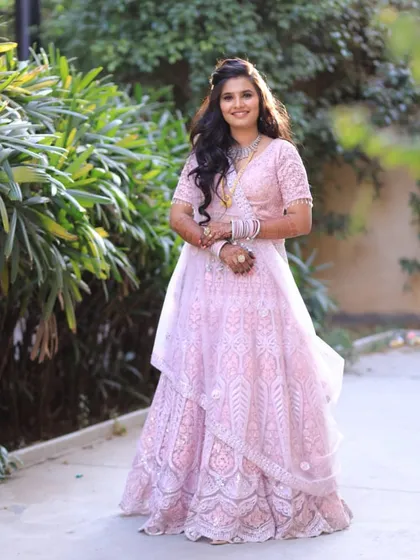 A full view of this elegant pink embroidered lehenga. It is a timeless and graceful option for any pre-wedding celebration.