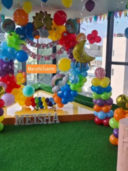 A different take on the rainbow theme, with a focus on primary colors and a green turf floor.