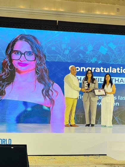 Our founder, Sharmila Thanki, on stage accepting her award. We are raising a toast to her incredible achievement and leadership.