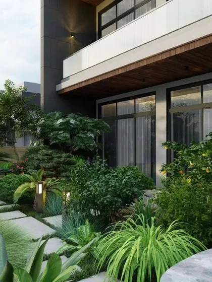 Our design for 'The Garden House' in Lucknow integrates architecture with nature. This view showcases the 1200 sq. ft. landscaped garden, designed as a lush, green heart of the home that provides a serene outlook from the main living areas.
