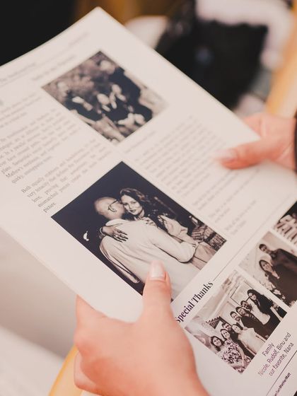 To share their story in a unique way, we created a custom wedding newspaper for the guests. It included their love story, photos, and a special thank you to their families, making for a wonderful keepsake.