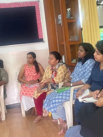 Our teachers taking notes and engaging in discussion during a professional development workshop, always striving to improve their skills.