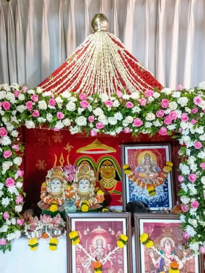 The decor for a Simant ceremony sets a divine tone. This beautiful setup with floral arrangements and portraits of deities created a warm, festive vibe for the traditional rituals.