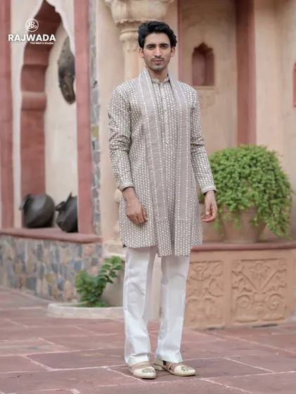 Another full-length shot of the beige printed kurta, demonstrating its classic style and easy elegance. It's an outfit that combines comfort with traditional charm.