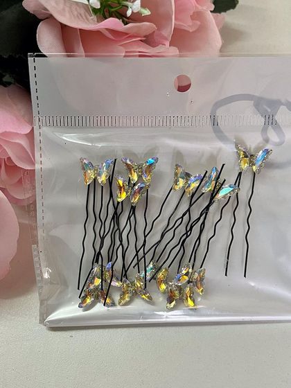 The warm tones of these golden-yellow butterfly pins are perfect for a Haldi ceremony or a fall wedding.