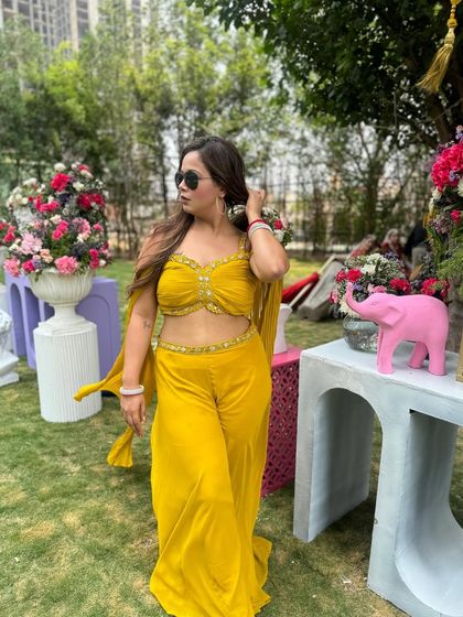 A full view of my vibrant yellow outfit for a Haldi ceremony. The color perfectly matched the sunny and celebratory mood of the day.