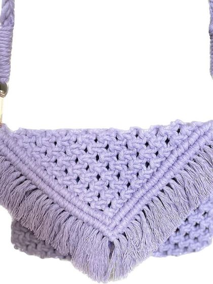 My lavender macrame sling bag, ready to go! The color is so calming, and the V-flap design is one of my most popular styles. It's a really versatile piece.