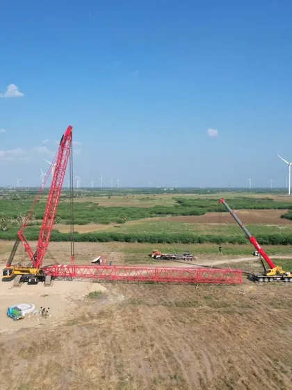 Heavy cranes at our project site in Tamil Nadu, preparing for the assembly of a wind turbine. The construction of our wind-solar hybrid facilities involves meticulous planning and execution by our experienced project delivery teams.