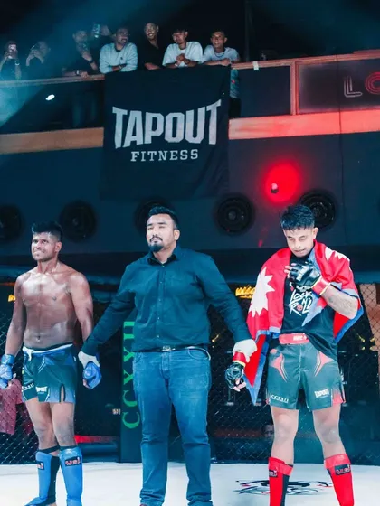 Giving final instructions before a bout at the Nepal Warrior Championship. My experience as a coach and fighter helps me be a better referee.