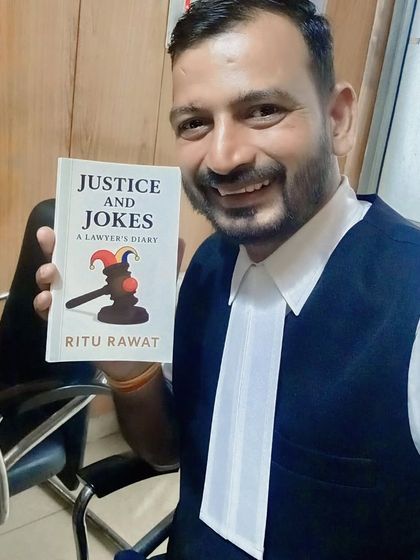 A cheerful selfie with the book. It's important to celebrate the achievements of our friends and colleagues.