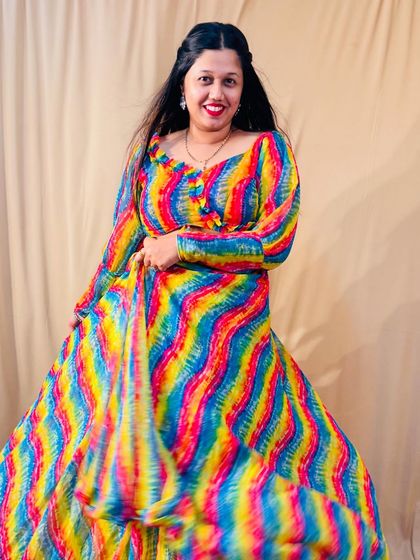This colourful carnival lehenga is a fantastic choice for a Mehendi or Sangeet night. The rainbow pattern is so unique and full of energy.