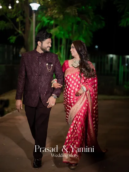 A classic reception portrait of the couple walking together at night, with beautiful lighting creating a romantic atmosphere.