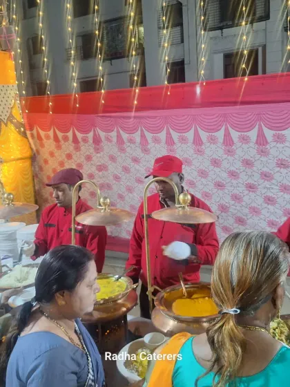 We love catering for large society functions. This photo captures the lively atmosphere as residents enjoy a full buffet spread at an evening event we managed.