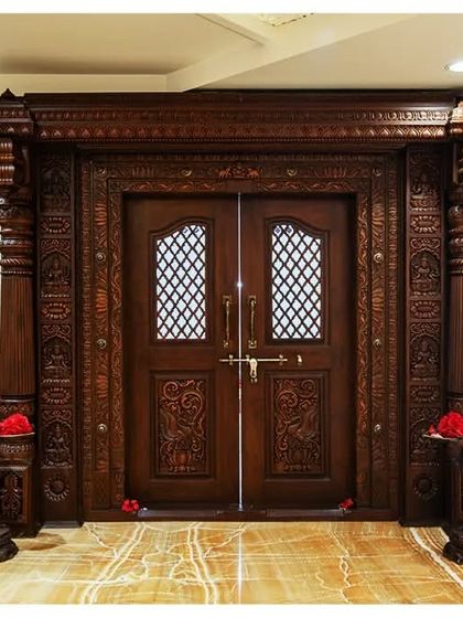 Another exquisitely carved wooden door within the palace, showcasing the traditional craftsmanship that we integrate into our classical designs.