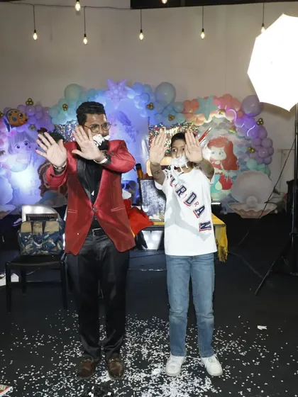 The grand finale of the paper-from-mouth trick. This is a perfect example of the hilarious and visual comedy I bring to every performance, engaging both the volunteers and the audience.
