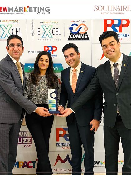 Another shot of our team celebrating their win at the BW Marketing EXCEL Awards, showcasing the collaborative spirit that drives our success.