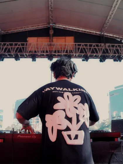 A view from behind the decks at Zomaland, looking out at the city skyline. A unique perspective from a massive stage.