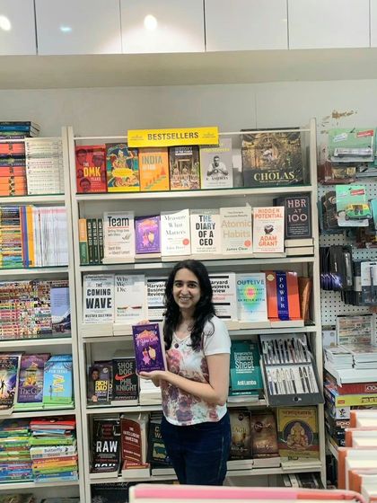 Posing with my book on a bestseller shelf. A proud moment from one of my bookstore visits.