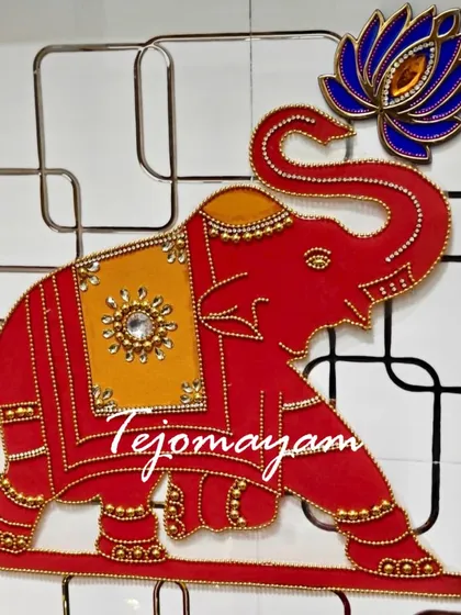 A beautiful handcrafted elephant wall hanging, perfect for adding a touch of tradition and blessing to a new home during a housewarming ceremony.