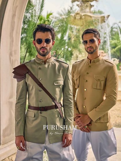 These ensembles are for the man who walks with history but owns the future. The blend of military-inspired tailoring with traditional Indian silhouettes creates a truly unique aesthetic.