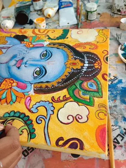 A student brings a vibrant Kerala mural to life, brushstroke by brushstroke. Our Indian folk art classes break down these timeless traditions, making them accessible and enjoyable for everyone to learn.