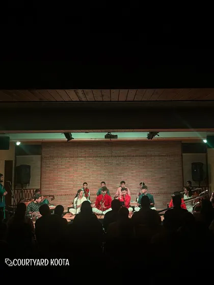 A wide shot of The Deutsch Bharatiya Big Band on stage, showing the scale of this incredible international collaboration. Our stage is flexible enough to host large ensembles like this.