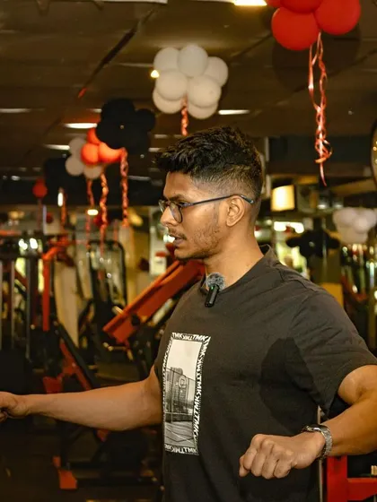 Demonstrating proper bench press setup during a workshop. I believe in educating athletes, so they understand the mechanics of each lift and can become smarter lifters themselves.