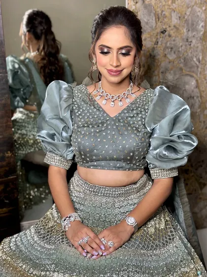 A close-up of the Sangeet glam. The shimmery eyeshadow and perfectly blended skin create a look that is both sparkling and sophisticated.