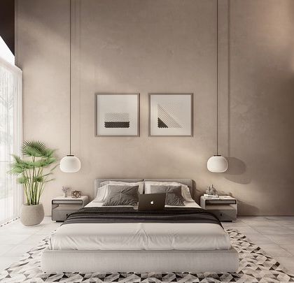 This bedroom render for Vagator Villas showcases a minimalist aesthetic with warm, earthy finishes. Pendant lights and simple geometric art complement the clean lines, while a large window maintains a strong connection to the Goan outdoors.