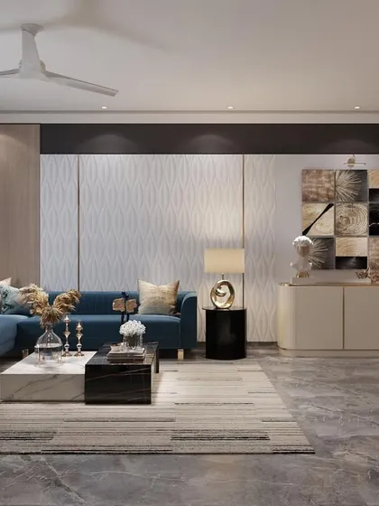 An informal lounge area designed to relax and watch TV after a long day. The space features a comfortable blue L-shaped sofa, modern art, and a built-in credenza for storage.