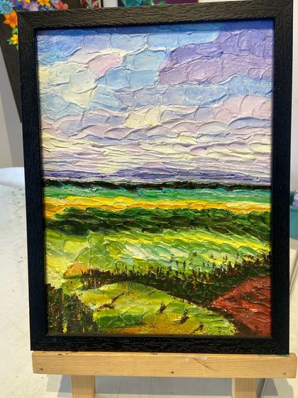 A framed landscape painting created in our acrylics short-term course. The course helps you develop the skills to create detailed and beautiful scenes.
