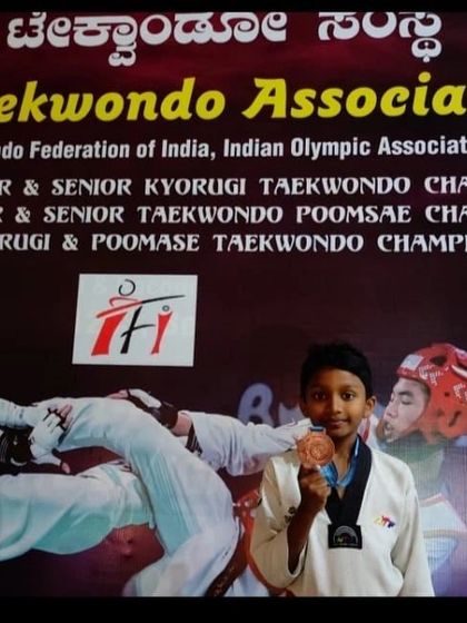 Kim's Taekwondo Academy - Competitive Taekwondo Coaching Our Champions: A Legacy of Medals photo 14