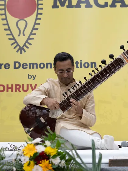 A close-up from my performance at Ramagya School. I often interact with students, explaining the structure of a raag and the role of different instruments.