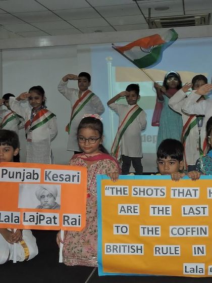 Students pay tribute to freedom fighter Lala Lajpat Rai, holding up a poster with his famous quote during the 'Jashn-e-Azadi' competition.