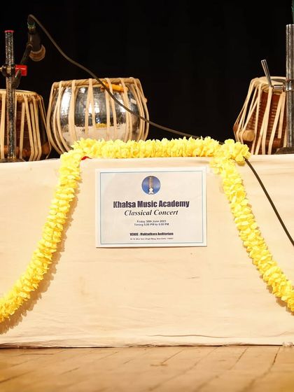 The stage is set for our Classical Concert, with tablas ready for our student performers.