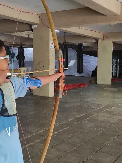 It all starts with the right form. This young archer is demonstrating excellent focus and technique, which are the core fundamentals we build upon in every session.