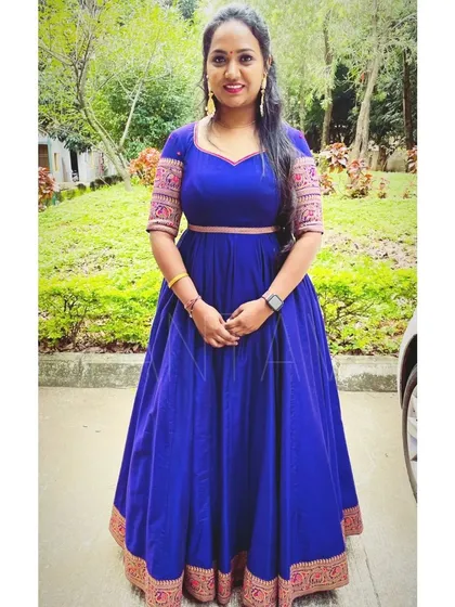 This gorgeous royal blue gown is one of my favorite client projects. We used her saree to create a classic Anarkali-style dress, using the decorative border on the sleeves and hem for a touch of tradition.