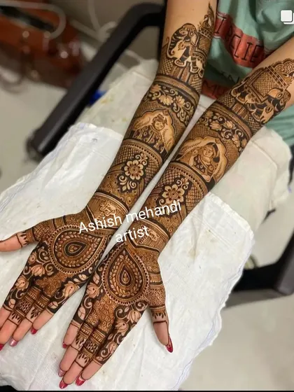 A unique design featuring portraits of deities on the forearms, with beautiful paisley patterns on the palms.
