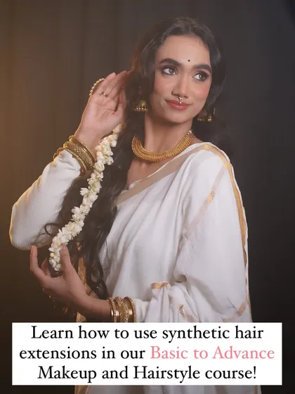 A close-up of the beautiful, long hairstyle created with extensions, perfect for the festive Onam look.