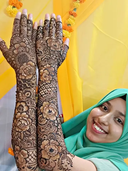 A close up of Sara's stunning bridal henna. The details of the roses and the intricate filler patterns are what make this design so special.
