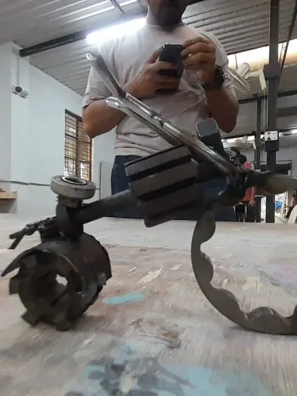 We believe in the power of upcycling. This detailed motorcycle sculpture was built entirely from scrap metal, proving that with a little creativity, you can make treasure from trash.
