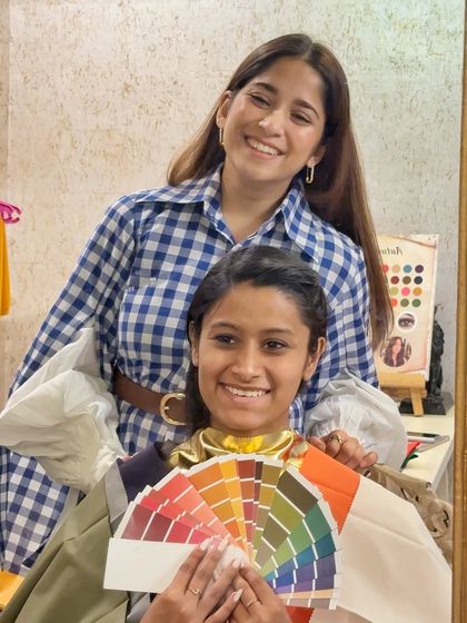 A happy moment captured during a color analysis session. Seeing my client's smile as she discovers her colors is what it's all about. This is a real photo from a session, which was later turned into a Ghibli-inspired artwork.