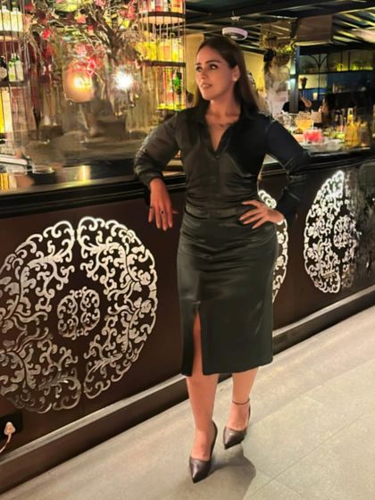 Channeling my inner Kardashian with this sleek, form-fitting satin dress. It's a perfect look for a dinner date or a night out at a stylish bar.