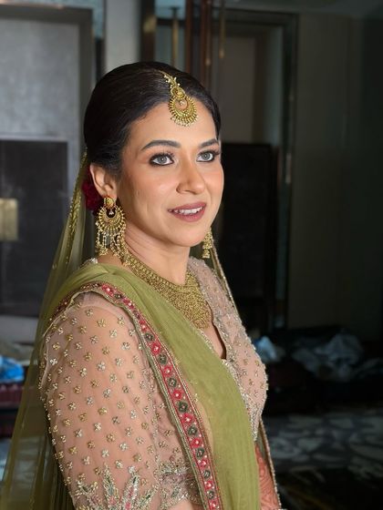 Another beautiful portrait, her expression confident and her makeup looking flawless.