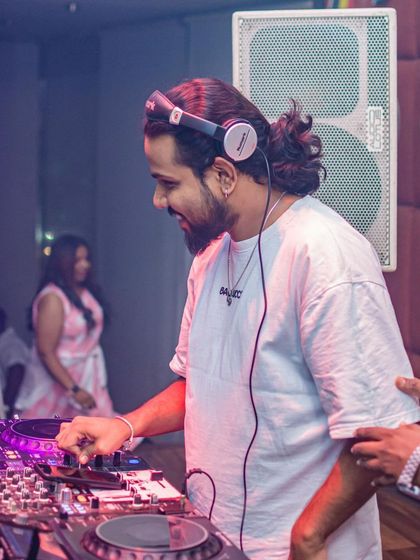 These shots capture me in my element, from different angles and at various events. Each one is a glimpse into my life as a music maker, focused on the craft and connecting with the crowd.